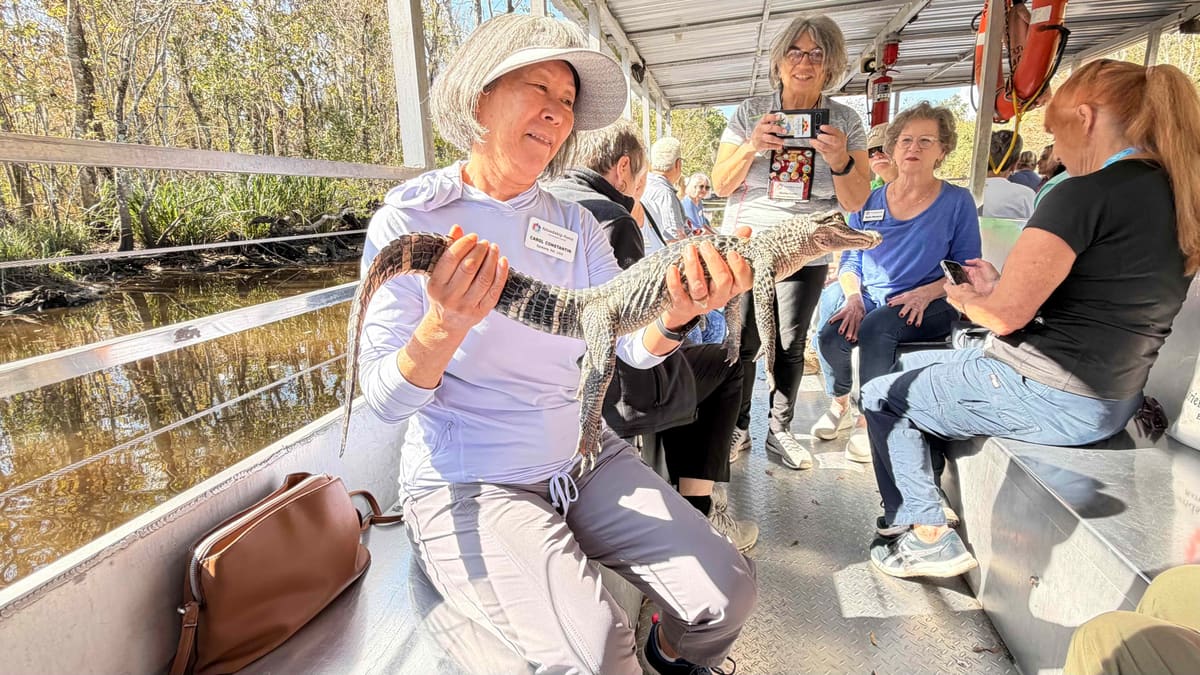 Swamp-Carol holding Bruce